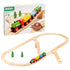 BRIO 65th Anniversary Train Set packaging showing colorful wooden train climbing bridge, anniversary logo, and assembled wooden railway track with trees.