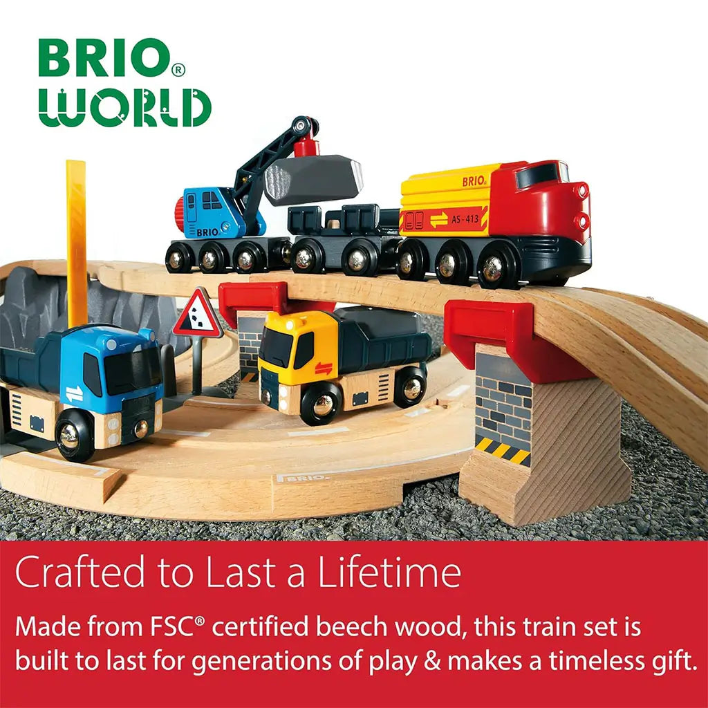 BRIO toy trucks, crane, and cargo train on wooden track bridge, emphasizing FSC-certified beech wood materials and long-lasting durability for imaginative children’s play.
