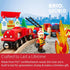 BRIO Firefighter Set close-up shows firefighter and red fire train at station with flame accessory, emphasizing FSC-certified beech wood and durable materials for play value.