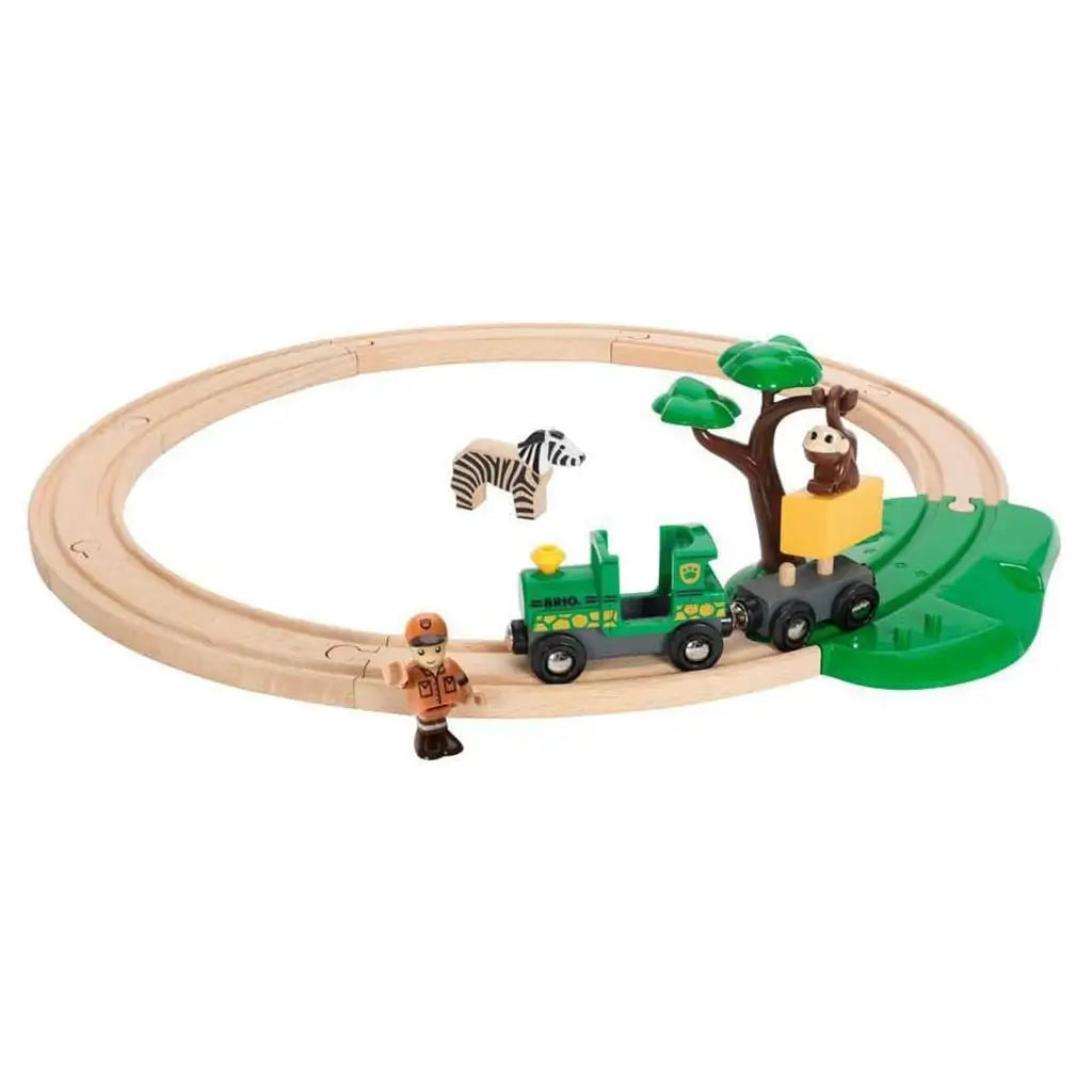 BRIO Safari Railway Set fully assembled with wooden tracks forms a circle, featuring a ranger, zebra, green train, and tree with a monkey and yellow block play feature.