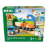 BRIO World Starter Lift and Load Set packaging in green box, showing wooden train track, crane, orange cargo engine, blue truck, and accessory pieces for imaginative play.