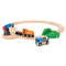 BRIO World Starter Lift and Load Set wooden train track arranged in an oval with crane, orange train, blue truck, green tunnel, and log accessory for interactive play.