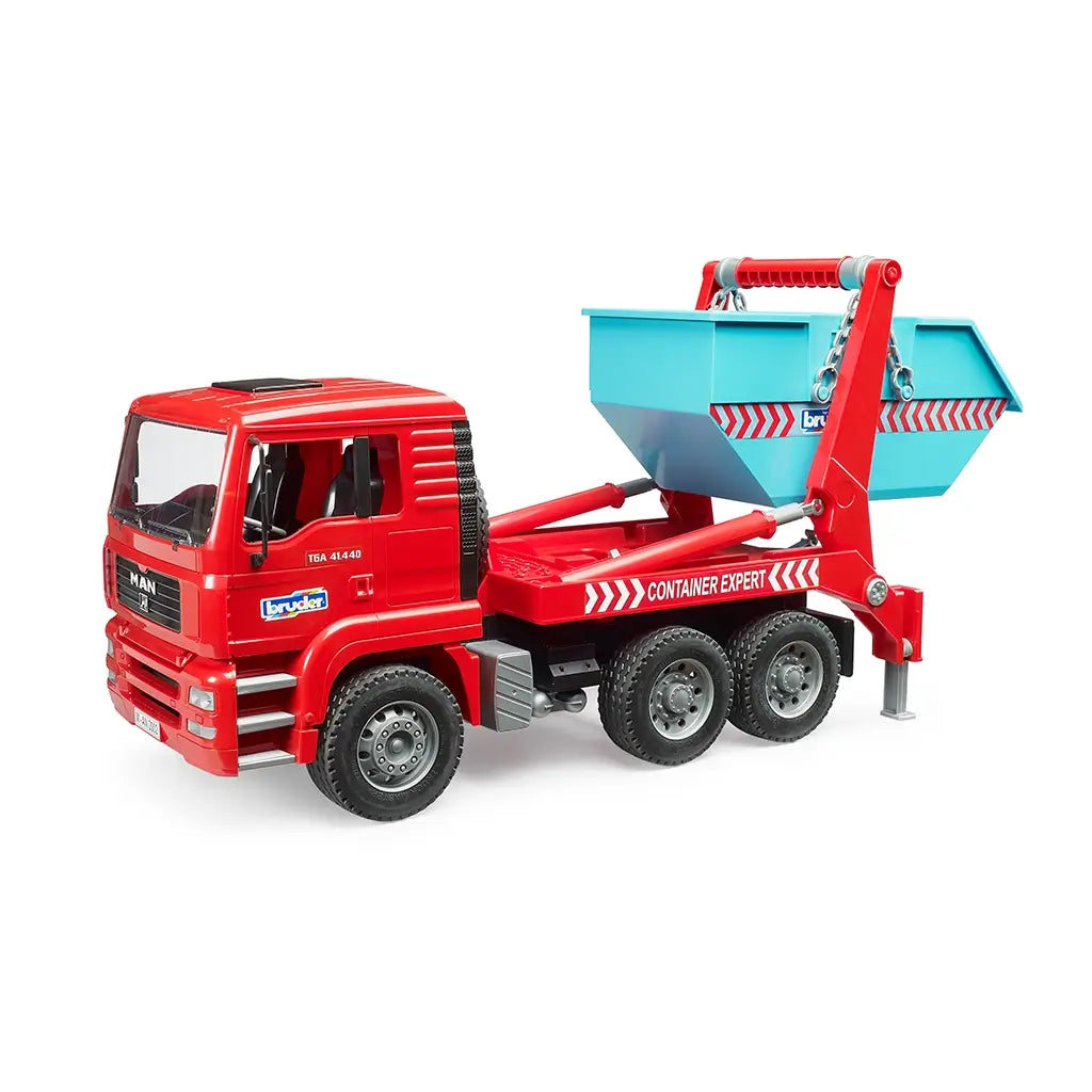 Bruder MAN TGA skip container truck toy in red plastic with turquoise and silver details, featuring a raised blue skip bin, hydraulic lift arms, and support leg on a white background.