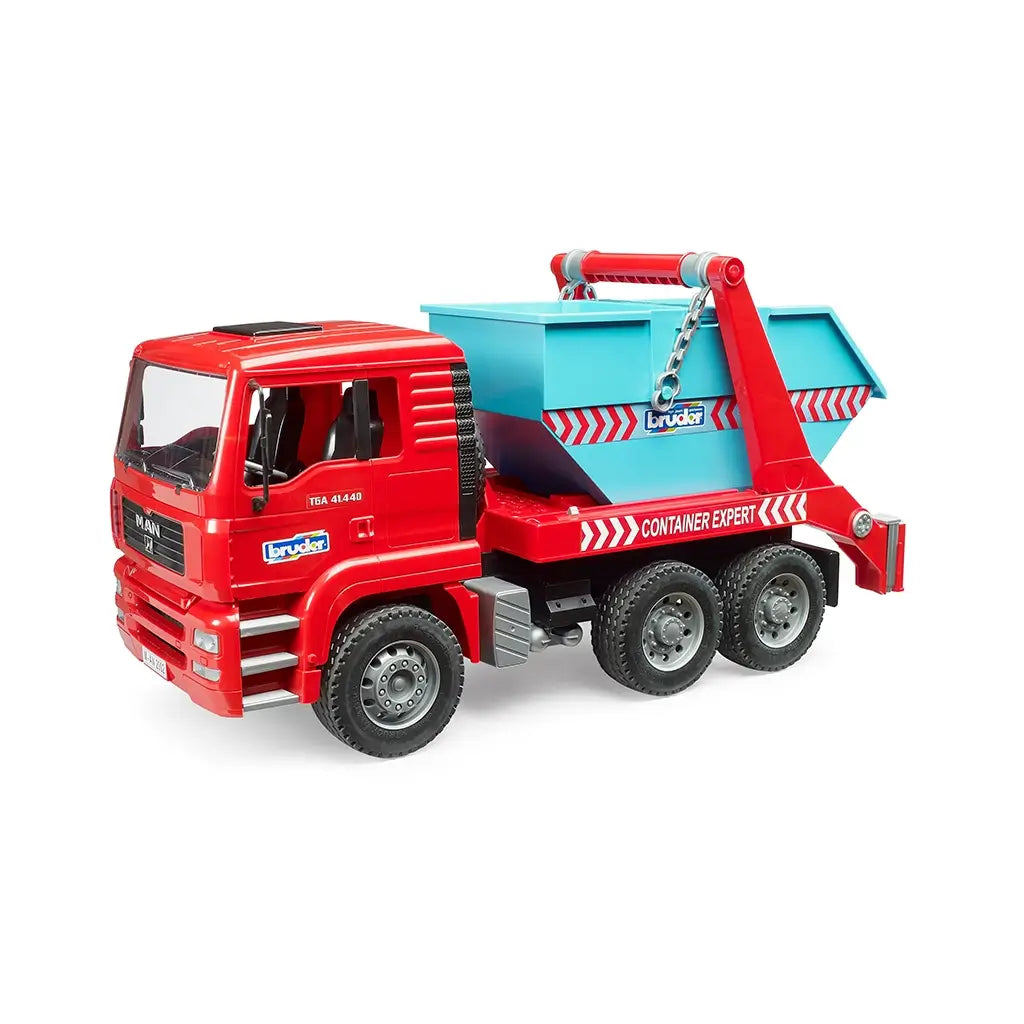 Bruder MAN TGA skip container truck toy in red plastic with turquoise, silver, and black details, featuring a chain-lift frame and mounted blue skip bin on a white background.