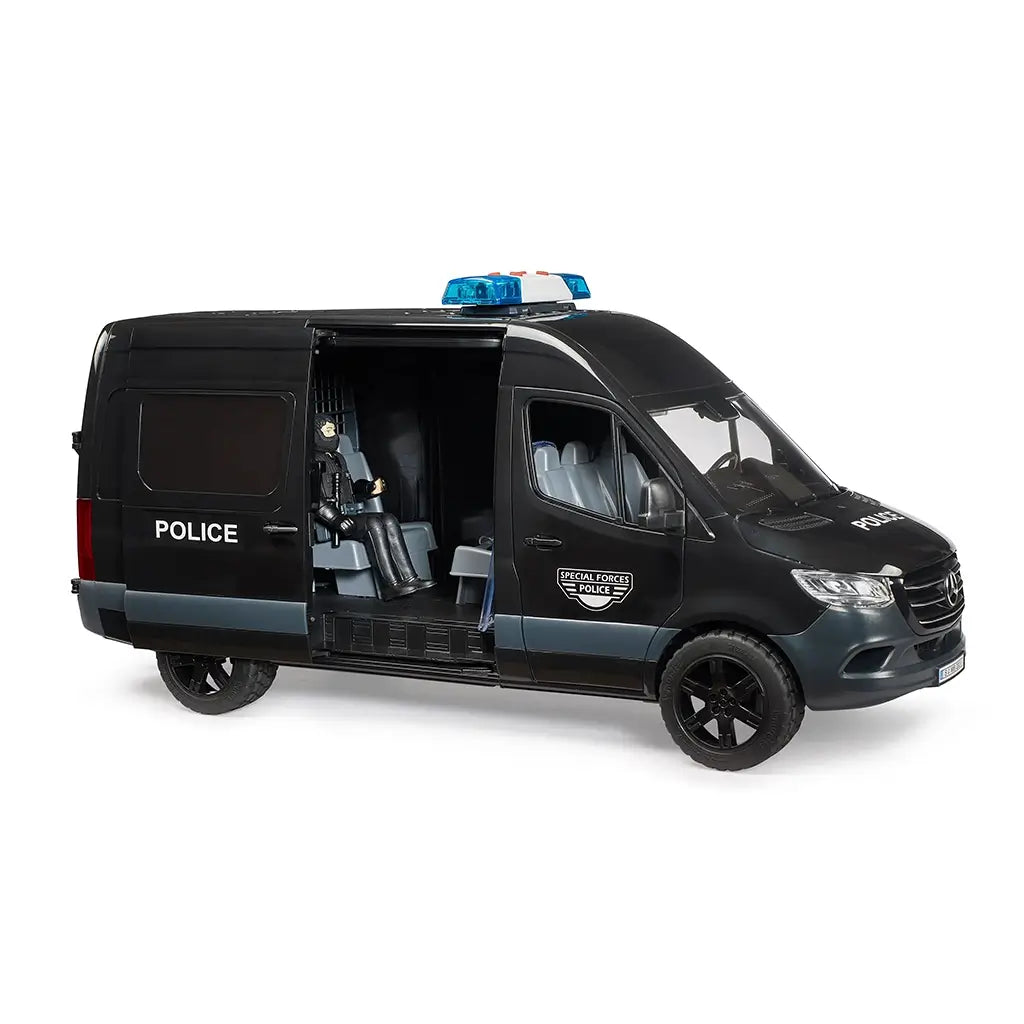 Bruder Mercedes-Benz Sprinter police van toy in black plastic with gray and blue details, featuring an open sliding door and seated police figure on a white background.