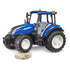 Bruder New Holland T5 120 1:16 toy tractor positioned on rocky terrain, highlighting its realistic suspension, rugged tire grip, and lifelike all-terrain performance for imaginative farm play.