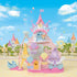 Calico Critters Baby Dream Amusement Park castle shows pastel pink plastic towers, Ferris wheel, swan boat ride, and hot air balloon gondola arranged in bright outdoor fairground setting.