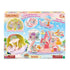 Calico Critters Baby Mermaid Castle set shows pastel pink plastic castle with ocean rides, wave slide, and carousel illustrated on retail box with sea themed graphics and character images.