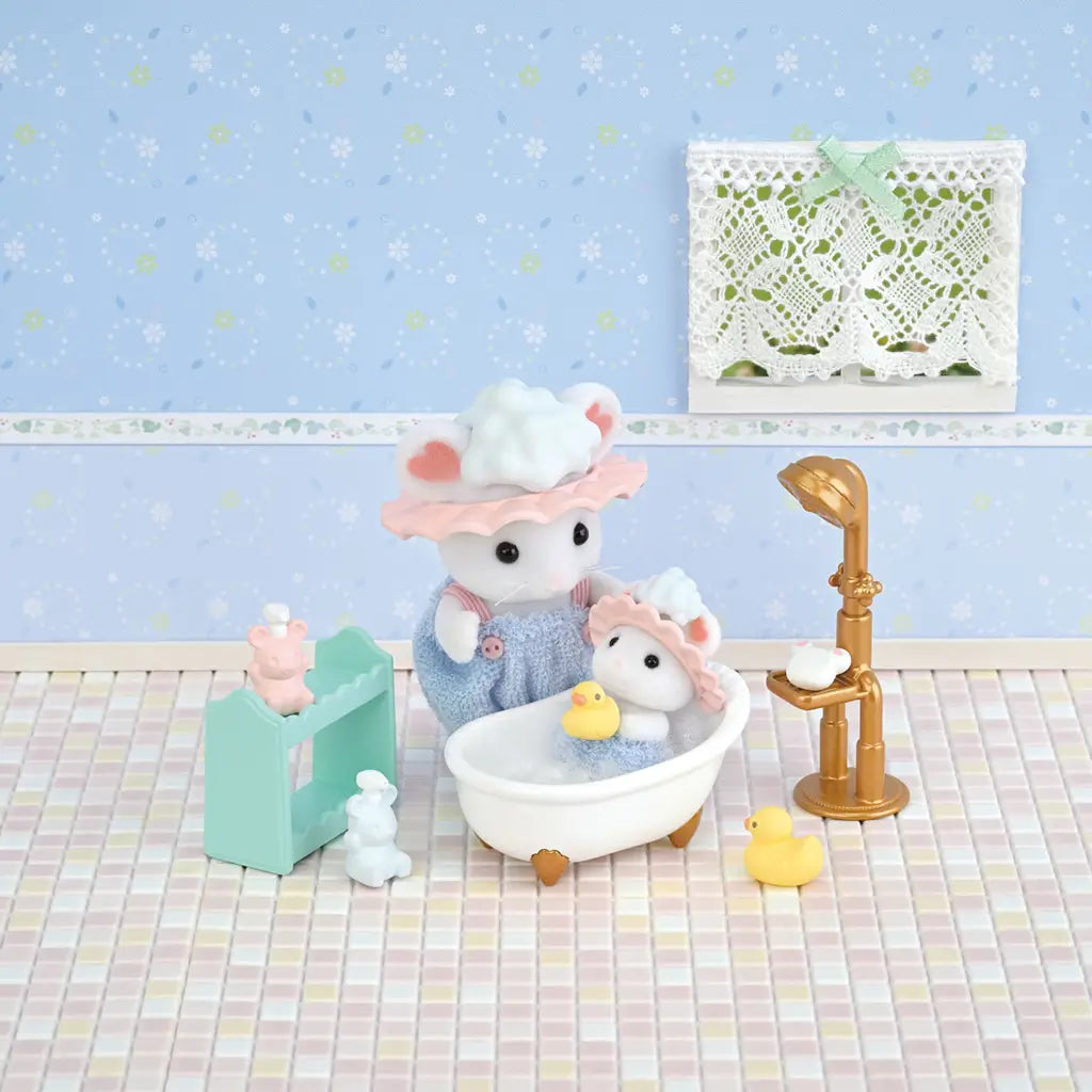 Calico Critters Bath Time Bubble Siblings scene with mouse siblings in a tiled room, bathtub, shower, toys, and shelf, styled with blue wallpaper and lace-trimmed window.