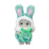 Calico Critters baby figure has gray flocked fur and a mint polka-dot plush bunny costume with tall ears, white fuzzy trim, and a green satin bow on a white background.