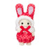 Calico Critters baby figure wears a red polka-dot plush bunny costume with tall ears, white fuzzy hood trim, and a red satin bow, posed against a white background.