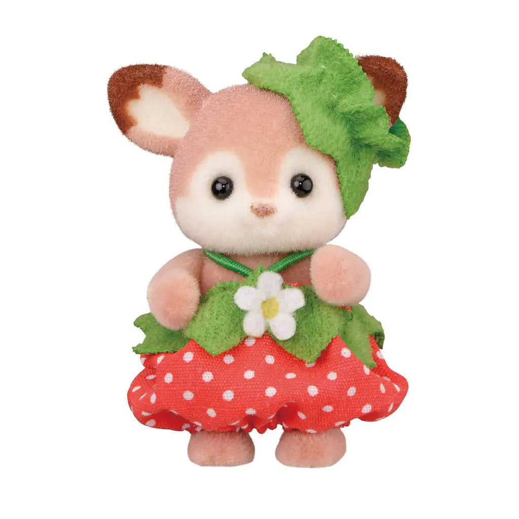 Calico Critters Very Berry Babies deer figure with tan and cream flocked texture, rounded ears, and gentle expression, wearing a red polka-dot strawberry skirt and green leaf details for themed collectible nursery play.