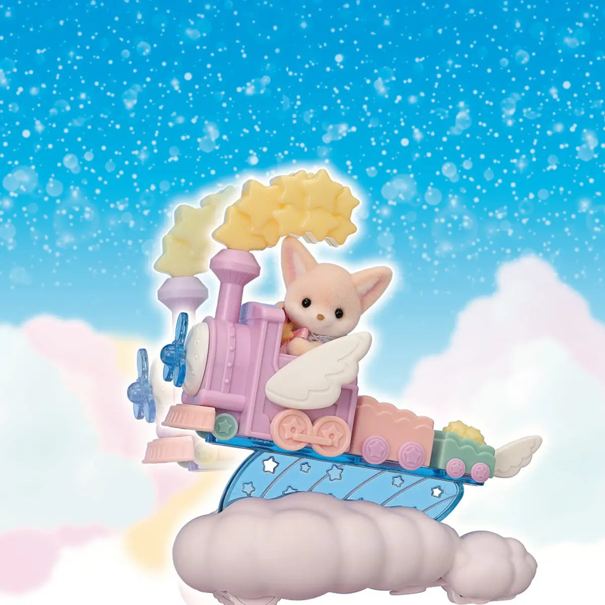 Calico Critters Daydream Parade Playset showing a pastel fennec fox figure riding a pink and blue winged train through clouds, with star-shaped smoke puffs and a glowing night-sky backdrop.