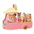 Pink three-wheeled Calico Critters Dip Dip Donuts wagon carries fox driver and three animal passengers including rabbit, kitten, and baby deer, each seated in open back compartments.