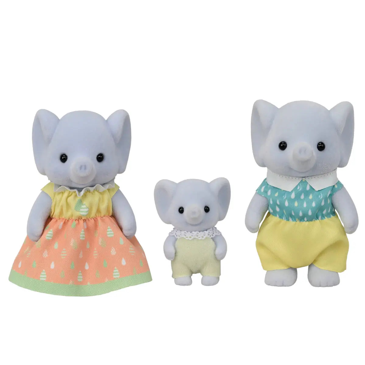 Calico Critters Elephant Family trio toy figures with soft gray flocked texture, featuring two adults and one baby dressed in pastel yellow, peach, and teal outfits, standing side by side on a white background.