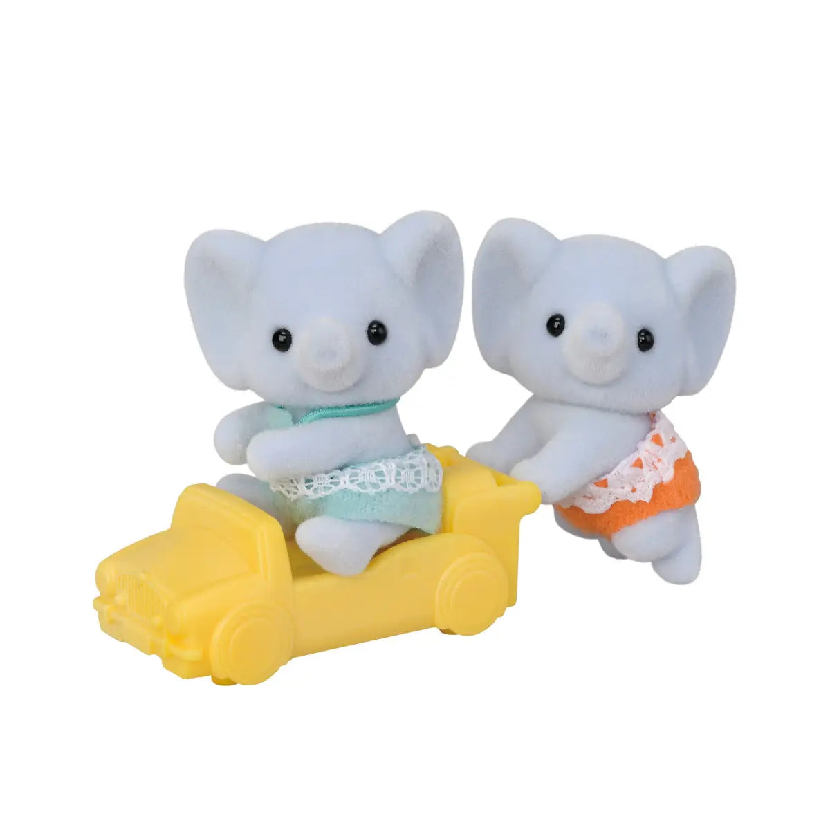 Calico Critters Elephant Twins toy set featuring two gray baby elephants with lace-trimmed clothing, one seated in a small yellow car while the other pushes from behind on a plain white surface.
