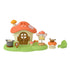 Calico Critters Fairy Mushroom House is a cream plastic cottage with an orange mushroom roof and green base, shown with a fairy figure, cooking pieces and leaf chair.