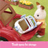 Calico Critters rabbit figure places folded blue stroller into open trunk of red toy car, demonstrating storage functionality with caption “Trunk opens for storage.”