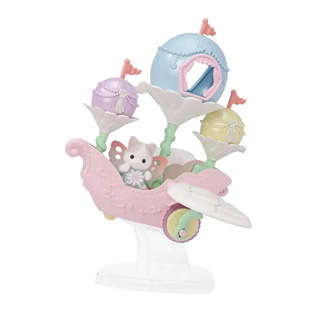 Calico Critters Floral Fantasy Skyship in pastel pink, blue, yellow and mint plastic features a winged Latte Cat baby, three pod cabins and white wings on a clear stand.
