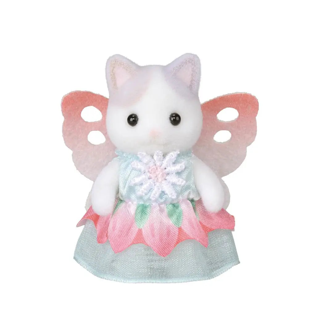 Calico Critters Latte Cat baby figure has soft white flocked fur, pink butterfly wings and a pastel blue and pink floral dress, photographed against a white background.
