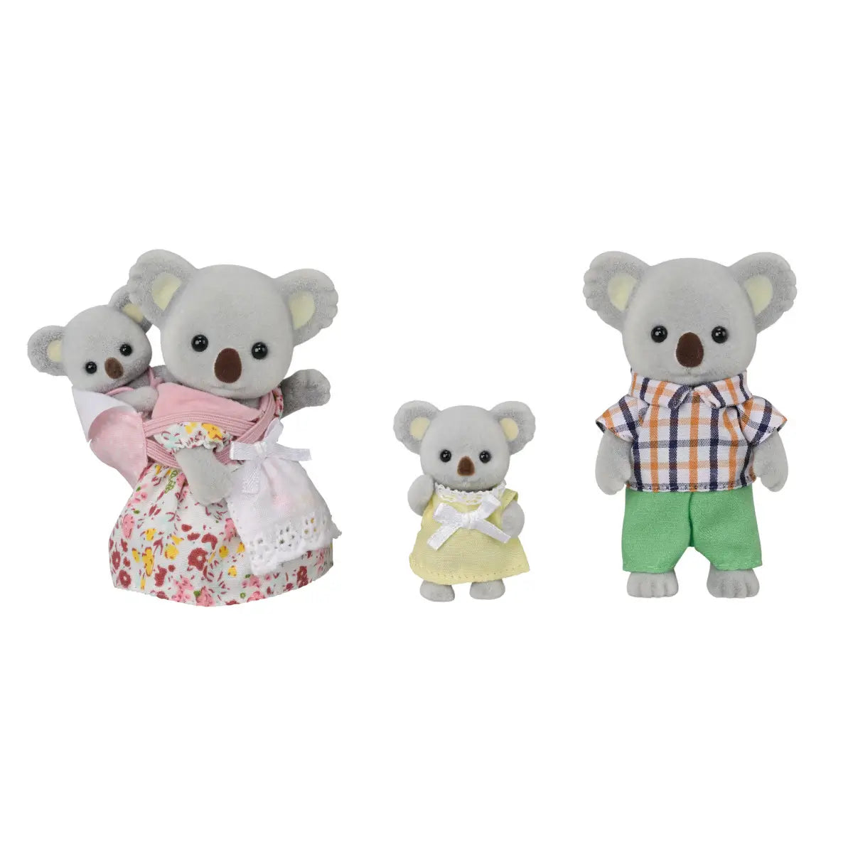 Calico Critters Koala Family figures show soft gray flocked koalas in floral dress with baby sling, pastel yellow dress, and plaid shirt with green shorts on white backdrop.