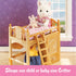 Wooden Calico Critters loft bed with floral bedding and ladder, shown with a white cat child figure holding a small bunny plush, demonstrating bed size for baby or child critters.