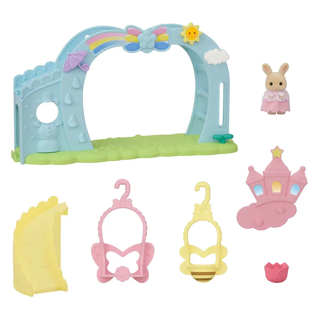 Calico Critters Nursery Swing parts and accessories displayed, including pastel arch, yellow slide, pink and yellow swings, crown topper, flower piece, and rabbit figure.