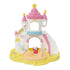 Calico Critters Nursery playset with pastel castle, rainbow arch, and yellow base configured as sandbox with bucket, ball, and molded sandcastle accessories.