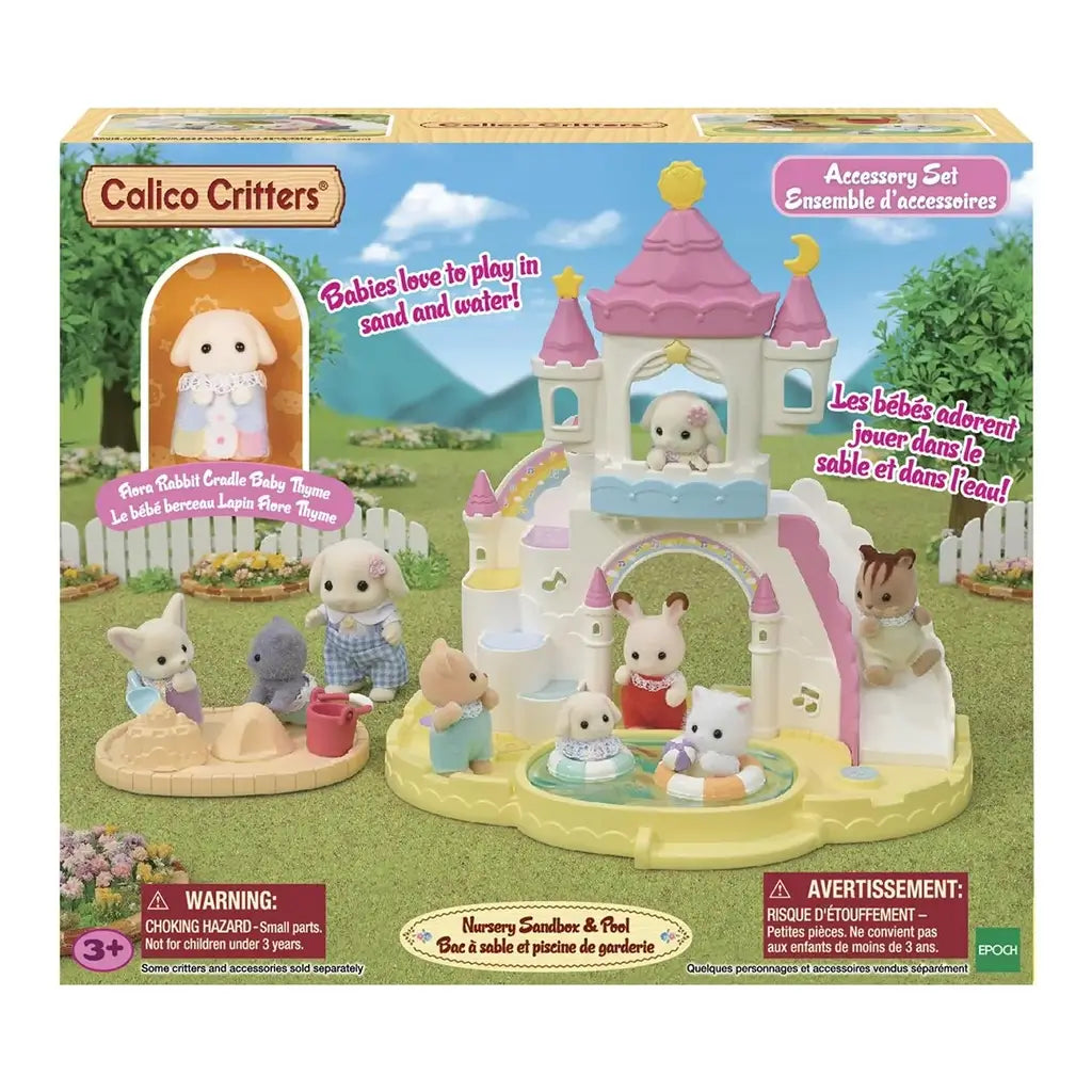 Retail packaging of Calico Critters Nursery Sandbox & Pool showing castle playset with water pool, sandbox, baby animal figures, and accessories displayed on grassy background.