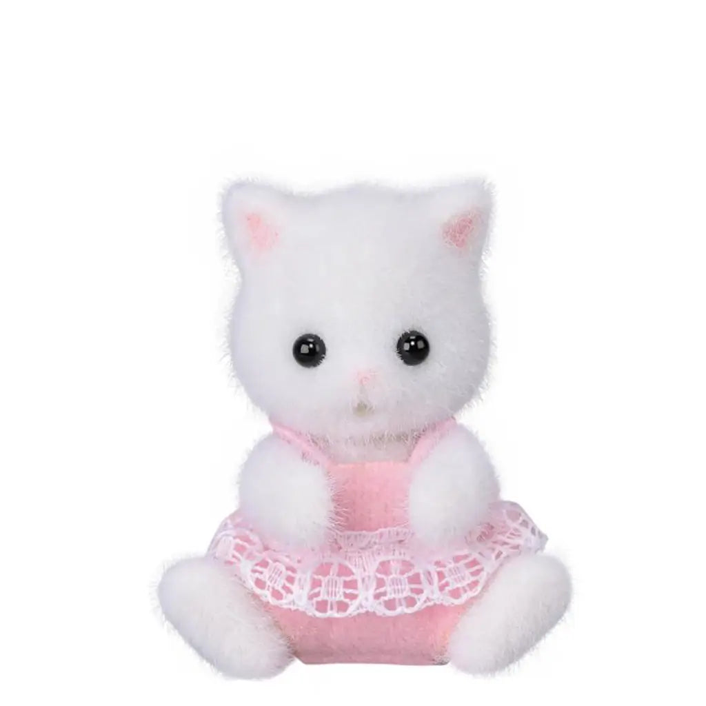 Calico Critters Persian Cat twin has white flocked fur, black eyes and pink ears, wearing a pink romper with white lace trim while seated on a white background.