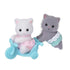 Calico Critters Persian Cat Twins set features white and gray flocked kittens in pink and aqua outfits, posed with a light blue tricycle against a white background.