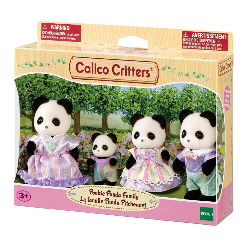 Calico Critters Pookie Panda Family package displays four black-and-white flocked panda figures in pastel outfits inside a windowed box with a garden backdrop.