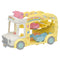 Calico Critters Rainbow Fun Nursery Bus in pastel yellow and white with music note decorations, seating inside, and pink ride accessories visible through side opening.