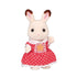 Calico Critters Chocolate Rabbit Girl figure with cream-colored fur, brown-tipped ears, and red polka-dot dress accented by lace and an orange flower, standing upright on a white background.