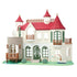 Calico Critters Red Roof Riverside Manor playset has white textured walls, red turret roofs, green arched doors, bronze balconies, river base, shrubs, and fishing boat.
