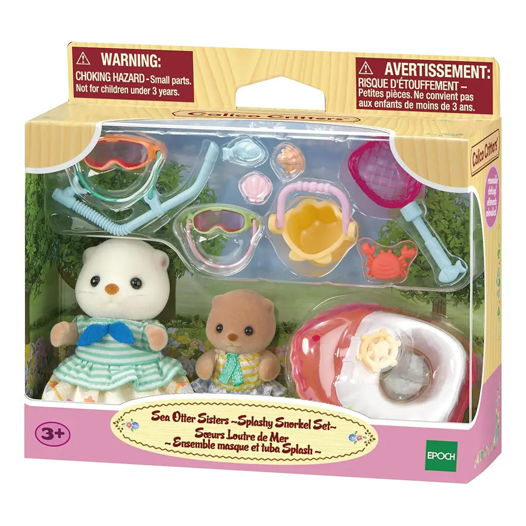 Calico Critters Sea Otter Sisters Splashy Snorkel Set retail package with dolls, goggles, snorkel, toy bucket, net, shells, crab, fish, and boat displayed through clear box window packaging.