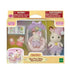 Front packaging of Calico Critters Sleepy Dream Siblings playset, showing accessories including cradle, plush bunnies, storybook, and dolls inside a clear display box.