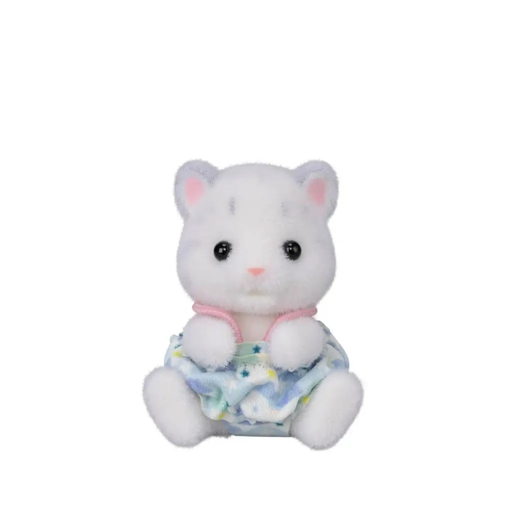 Calico Critters Snow Leopard baby figure has white flocked fur, gray spots and pink ears, wearing a pale blue patterned outfit with pink trim while seated on white.