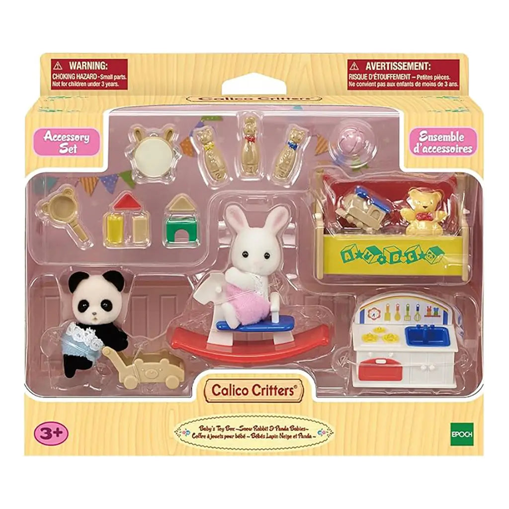 Retail package of Calico Critters Baby’s Toy Box Set featuring panda and snow rabbit baby figures, toy furniture, rocking horse, blocks, and accessories displayed in clear plastic tray.