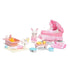 Calico Critters Sophie’s Love ’n Care set includes baby rabbit figurine, pink polka-dot stroller with lace trim, toy bathtub, feeding table, bottles, potty, and miniature nursery items.