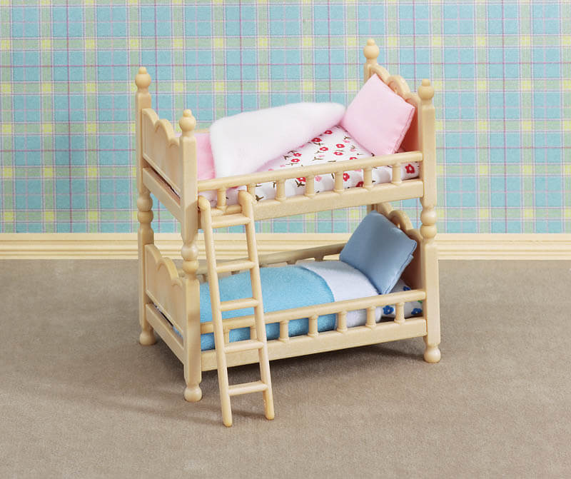 Calico Critters Stack and Play Beds Furniture Set shown with a plaid background