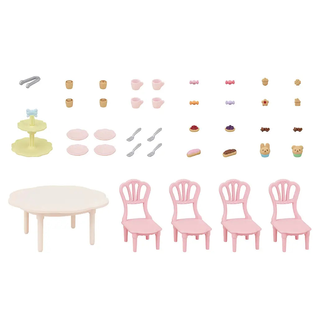 Complete Calico Critters Sweets Party Set pieces laid out, showing pastel chairs, round table, tiered stand, miniature cakes, cookies, pastries, cups, and utensils.