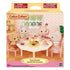 Box front of Calico Critters Sweets Party Set featuring critters at pastel table with tiered dessert stand, tea cups, pastries, and detailed room backdrop.