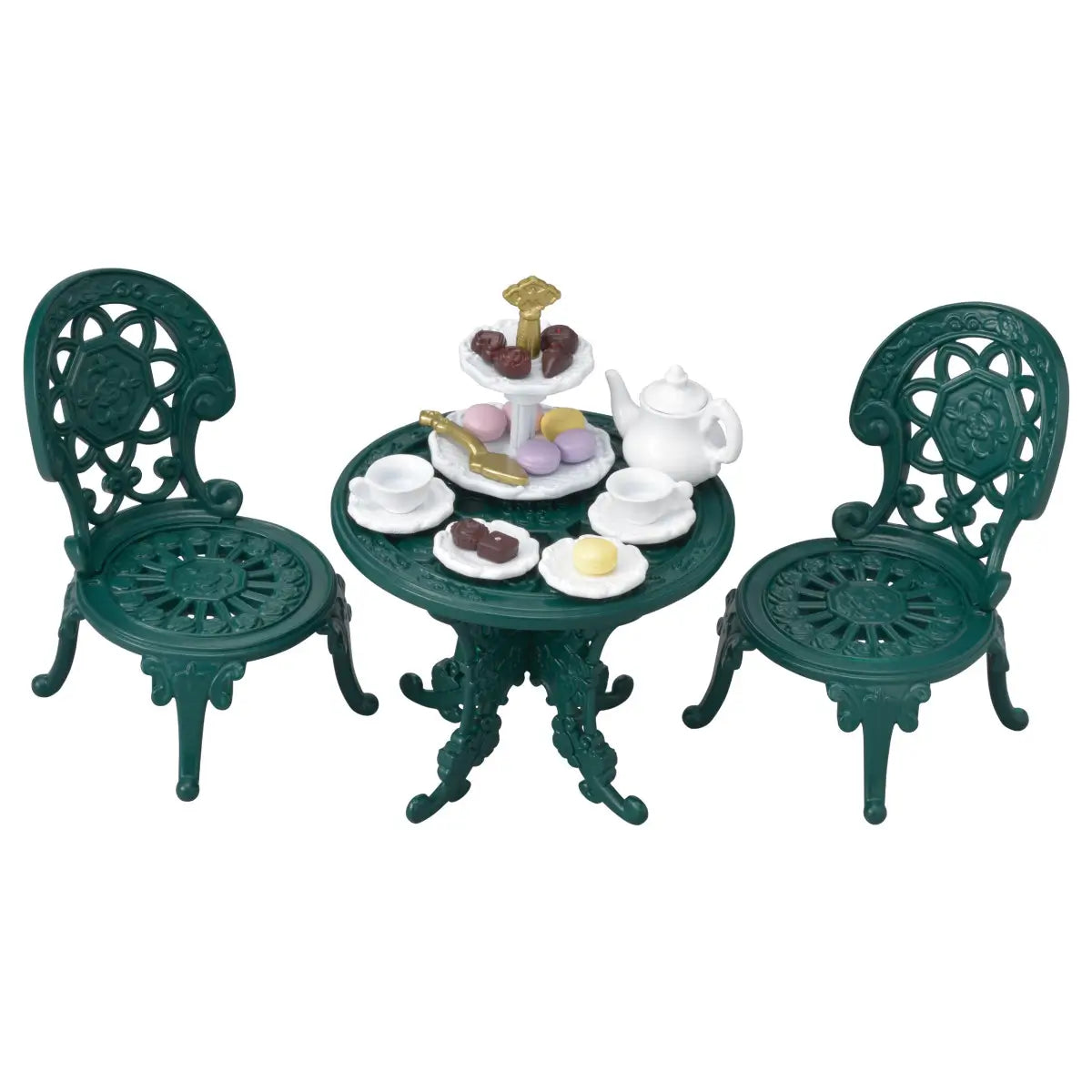 Calico Critters Tea and Treats set includes dark green molded plastic bistro table and two chairs with white teapot, cups, tiered pastry tray, pastel macarons, and chocolate sweets displayed on white background.