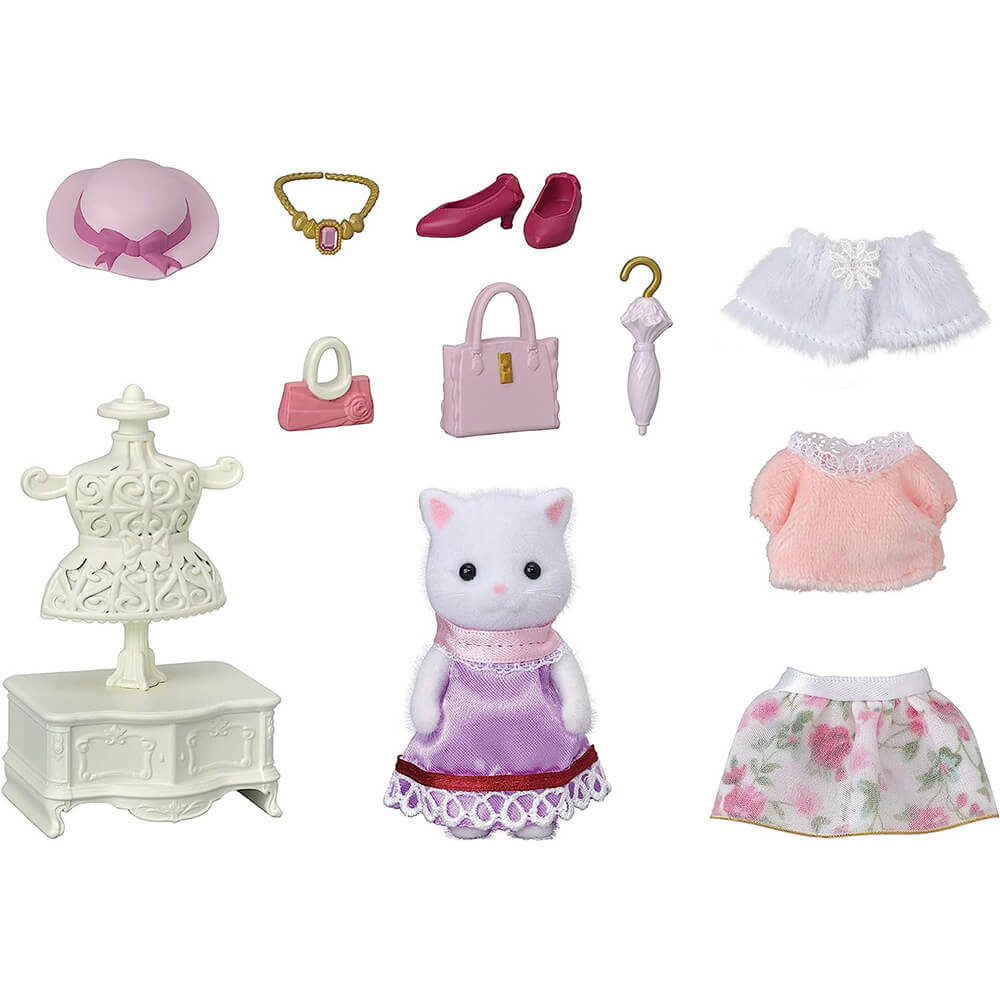 Picture of what comes with the Calico Critters Town Girl Fashion Playset with Persian Cat