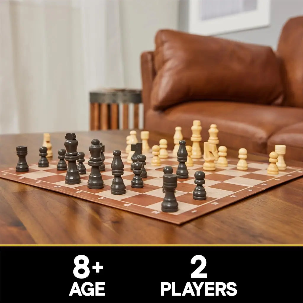 Wooden chessboard with black and light wooden pieces set up for play on a living room table, labeled for two players aged eight and up, promoting classic strategy gameplay.