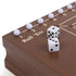 Cardinal Classics Roll Em dice game on a polished brown wooden board with numbered track and smooth white pegs, featuring two white dice for interactive family tabletop play.