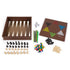 Cardinal Classics Family 10-Game Set components displayed with wooden backgammon board, chess pieces, colorful marbles, pick-up sticks, dice and round checkers arranged on a white background.
