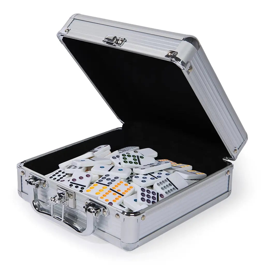 Cardinal Classics Mexican Train Dominoes set in a brushed silver aluminum case with chrome handle and latches, filled with white domino tiles featuring multicolor pips, shown open on a clean white surface.