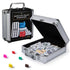 Cardinal Classics Mexican Train Dominoes set in a silver aluminum carrying case with black panel label, white domino tiles and colorful plastic train markers displayed beside the open storage box on a white background.